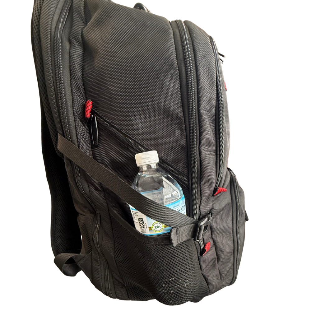 mesh side pockets on Fly Out Day Backpack holding water bottle